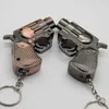 Lighters Cool Mini Revolver Butane Gas Inflatable Windproof Direct Injection Lighter Metal Peculiar Small Gun Key Chain Pendant Lighter YQ240124