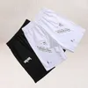 2022 Summer Fashion Brand Style White Cartoon Shorts Loose Casual Men's and Women's Love Pants gym1424436