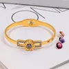 Fashion Design 3 colori braccialetti da donna numeri romani tridimensionale colorato CZ pietra cambiamento diamante scavato acciaio al titanio Bra229r