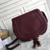 Designer 2024 Nouveau style en cuir Marcie petit sac de selle en cuir de veau grainé Tan Messenger Purse Hot Luxurys Sacs à bandoulière Portefeuille Sac de soirée Mode Femmes Sacs