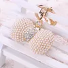 Keychains Chaveiro! Fashion Creative Lovely Imitation Pearl Bow Key Chain Ring Holder Llaveros Rhinestone Women Bag Tillbehör