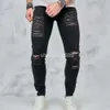 Mäns jeans män streetwear rippade massiva mager blyertsbyxor manliga snygga hål oroliga smala denim byxor