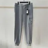 Pantaloni da uomo 23SS Abbigliamento firmato La migliore qualità Pantaloni CP Pantaloni da uomo Pantaloni da donna Pantaloni sportivi causali Capispalla invernale Pantaloni oversize Pantaloni da donna con distintivo Asi