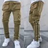 Pantaloni da uomo Pantaloni casual da uomo Hip Hop Pantaloni cargo multitasche riflettenti larghi popolari europei Pantaloni sportivi da uomo T240124