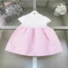 Vestido de menina de luxo linda saia rosa criança tamanho 90-160 designer carta impressão vestidos de bebê manga curta lapela crianças vestido jan20
