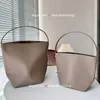 Water Bucket Bag Genuine Leather Large Capacity Head Layer Cowhide Premium Sense Commuting One Shoulder Handheld Minimalist Women's Tote Bag