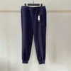 Pantaloni da uomo 23SS Abbigliamento firmato La migliore qualità Pantaloni CP Pantaloni da uomo Pantaloni da donna Pantaloni sportivi causali Capispalla invernale Pantaloni oversize Pantaloni da donna con distintivo Asi