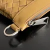 10a bolsas de nudo de embrague con bolso de cuero genuino de hombre elegante