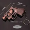 Lighters Cool Mini Revolver Butane Gas Inflatable Windproof Direct Injection Lighter Metal Peculiar Small Gun Key Chain Pendant Lighter YQ240124