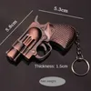 Tändare Cool Mini Revolver Butane Gas Uppblåsbar vindtät direktinsprutning Ljusare metall speciell liten pistolnyckelkedja Pendant Lighter YQ240124