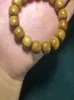 Strand vintage natural pulseiras de seda dourada babá buda contas nicho oração brinquedos culturais de madeira 12mm