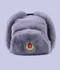 Radziecka odznaka Ushanka Rosjanie mężczyźni kobiety Winter Hats Faux Rabbit Fur Army Bomber Hat Cossack Traper Earflap Snow Ski Cap 21801302