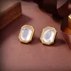 10A Nowy kwadratowy diament spójny mosiężny materiał galwanizowany złote kobiety modne kolczyki