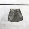 Modetrend-Herrenshorts Markendesigner Männer Kurze Luxus-Sportnylon-Knielange Shorts Sommer lässige Strandshorts ESSENTI-Hosen