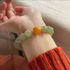 Charm-Armbänder, natürliches Hetian-Jade-Armband, sonniges Wasser, altmodische Perle mit Bienenwachs, modischer, frischer Einzelring für Herren und Damen