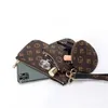 2020 Vrouwen Vintage Brand Koppeling Zipper Coin Bag Classical Flower Nieuwe PU Designer Handtassen Q1117227M