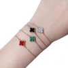 Van-Clef Arpes Bracciale Designer Moda di lusso Donna Versione alta Mini Bracciale a fiore singolo V Placcato in oro spesso 18 carati Rosa Double Sided Fritillaria bianca