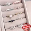 Anelli da dito in argento sterling a tripla fila alla moda e senza tempo Anello rotondo con CZ trasparente per gioielleria raffinata da donna