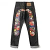 Calças de brim europeias e americanas de alta rua Hip Hop Graffiti Imprimir Jeans Marca na moda Slim Straight Wide Leg Pants Calças 240124