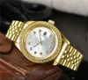 Luxury Watch Clean Factory Designer Full Chepp Full Male Crystal Style Date avec une bande de métal en acier Clock 7FNQ