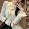 Women's T Shirts 2024 Spring O-neck Bow Lace-up Hollow Solid Color Long-sleeved Cardigan Women Casual Pleated A-line Skirt Two-piece Suit