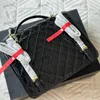 24c Star Patent skórzany czarny plecak 31 cm moda damska torba na ramię skórzana Diamond Złota sprzętowa burzą luksusowe torebki crossbody torby na zakupy szkolne torby na zakupy szkolne