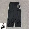 Calças masculinas 2024 preto agulhas largas homens mulheres pista oversize awge sweatpants bordados borboleta listra calças