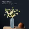 Decoratieve bloemen Nordic minimalistische PE abstracte vaas menselijk gezicht creatieve tentoonstellingsruimte Figue hoofdvorm vaas-groen