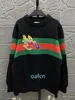 24SS herrtröja med broderade röda och gröna pärlor drake år begränsad upplaga kvinnors mode casual color block svart 439 s-xl