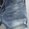 Jeans da uomo Moda estiva Uomo retrò azzurro tinta unita lavato elastico corto strappato jeans vintage firmati in rilievo