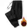 メンズパンツ2024冬のジップポケットが厚いフリーススウェットパンツ男性ジョガーブラックグレーダウンコットンウォームオスの水プルーフサー​​マルズボン