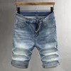 Jeans da uomo Moda estiva Uomo retrò azzurro tinta unita lavato elastico corto strappato jeans vintage firmati in rilievo