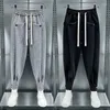 Men's Pants 2024 Brand Casual Sports Korean Style Fashion Bind Feet Button Outdoors Sweatpants Men Elastic Bunched Foot Trousers