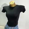 T-shirts pour femmes en gros sexy base mince chemise d'été femmes haute strech transparent hauts serrés à manches courtes solide mince transparent