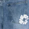 Jeans de jeans masculino Designer de shorts masculinos brancos design de borla preto azul americano shorts de tendência de rua