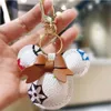 Tillbehör Designer Keychain Mouse Diamond Chain Design Car Key Chains Bag Charm Favor Flower Pendant Jewelry Keyring Fashion PU11