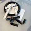 2024SS Designer Jewelry Sweet Bow Spring Clips Black White Ribbon Bowknot Head Barrettes Double Layer Women Hairpin Fashion Headwear