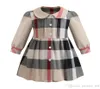 Girls Plaid Dress 2019 Ins New Styles Autumn Girl Kids Cute Doll Collar Plaid tryckt långärmad barn av hög kvalitet bomull PLE4023501