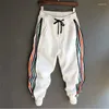 Pantaloni da uomo Hip Hop Streetwear Uomo Patchwork a righe Harem Pantaloni sportivi da jogging con risvolto ampio per uomo