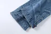 Jeans da uomo Arrivo 1041 Pantaloni svasati blu moda con tasca per uomo Bottoni Gambe Polsini Slim Denim