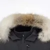 Piumino lungo da donna invernale canadese in vera pelliccia di coyote Kensington Parka in piumino d'oca caldo classico con cappuccio