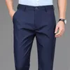 Pantaloni casual eleganti da uomo Pantaloni sportivi elasticizzati da uomo Pantaloni da lavoro ad asciugatura rapida Primavera Autunno Lunghezza intera Pantaloni da lavoro dritti da ufficio neri blu scuro 240125