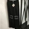 Pantaloni casual a vita elastica Pantaloni larghi ricamati da donna Pantaloni sportivi alla moda Pantaloni sportivi da corsa fitness