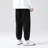 Pantaloni da uomo Primavera Autunno Lettera Harem Uomo Casual Hip Hop Streetwear Nero Grigio Pantaloni sportivi larghi Jogger Plus Size Pantaloni larghi