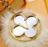 Designer Flower Mirror Keychain Handmade Copper Heart Pattern Key Chains Portable Car Keychains Bag Charm Decoration Fashion Hairball Pendant Accessories