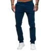 Printemps et automne nouveaux pantalons décontractés confortable Style européen et américain coupe ajustée hommes mode couleur unie pantalons