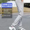 Мужские брюки 2024, осенние свободные спортивные штаны из искусственного хлопка с монограммой и карманом на молнии, большие размеры, ветрозащитные 8XL