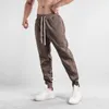Pantalon de survêtement élégant pour hommes, avec boutons froissés, jambes de pantalon, couleur unie, cordon de serrage, Double poche, tenue quotidienne décontractée