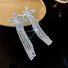 Diseñadora Viviane Westwoods Vivienen Empress Dowager Xis Nuevos aretes largos con borlas de Saturno y diamantes completos para mujeres con temperamento versátil y a la moda 2666+6