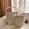 Luxe witte draagtas Designer Handtas De klassieke vrouw lederen emmer zwart bruin rij park handtassen half maan schoudertassen bakken